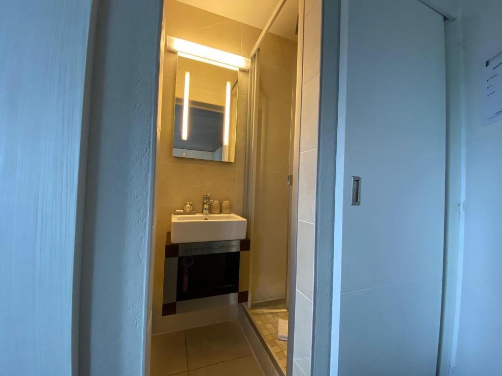 Ein Badezimmer in der Unterkunft Auberge de Confignon