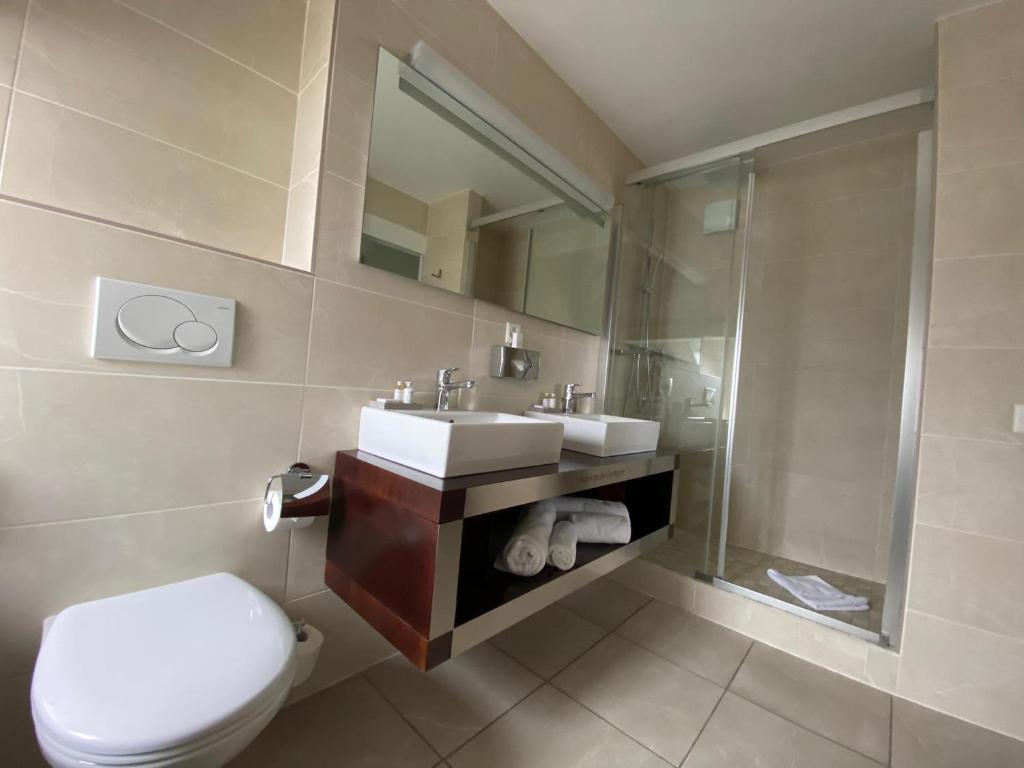 Ein Badezimmer in der Unterkunft Auberge de Confignon