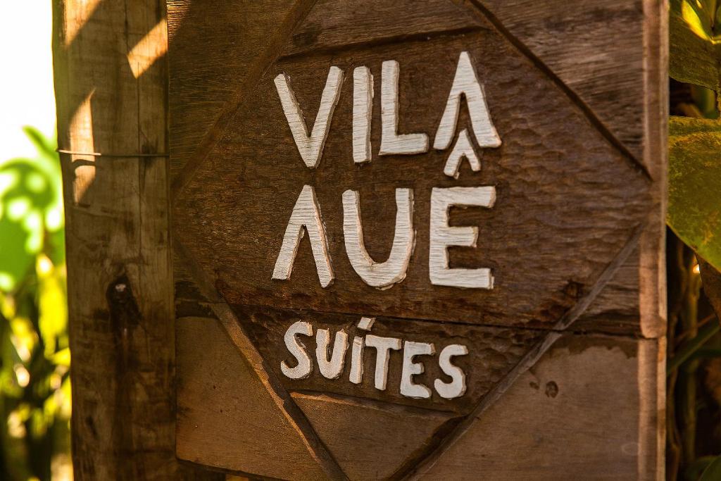 a sign that says vla aave suites at Vila Auê Suites in Caraíva