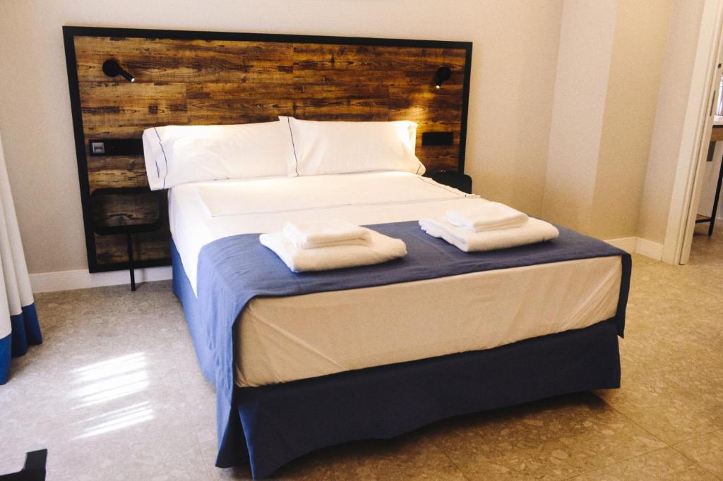 Postel nebo postele na pokoji v ubytování GBH Hotel-Apartamentos Posidonia