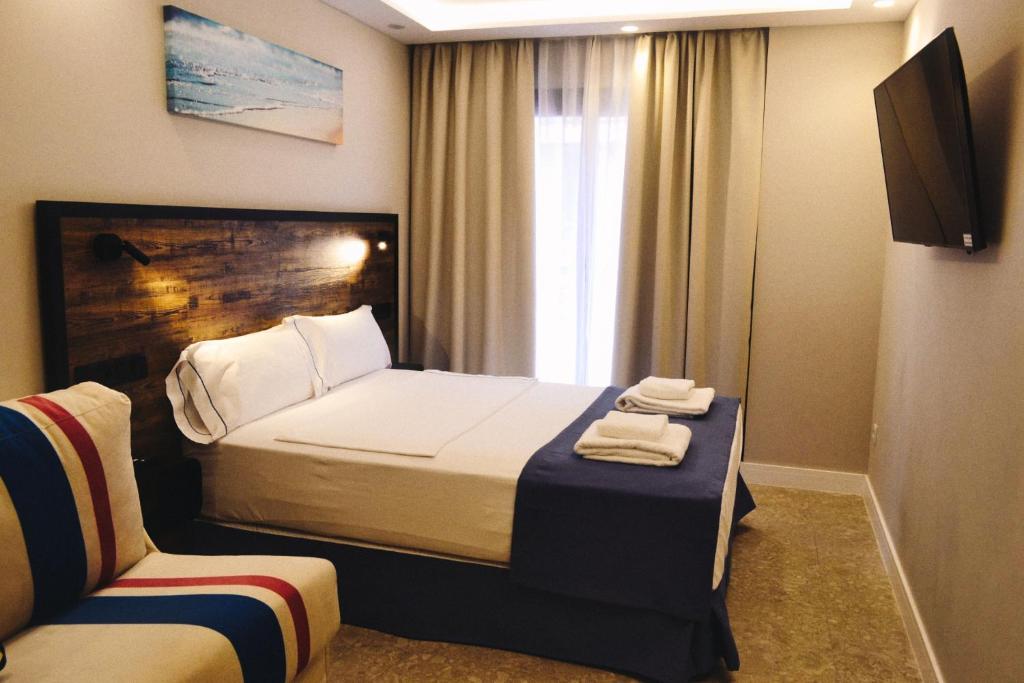 Postel nebo postele na pokoji v ubytování GBH Hotel-Apartamentos Posidonia