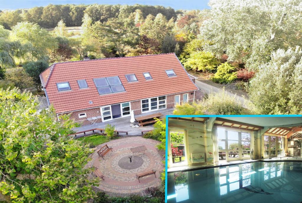 an aerial view of a house with a swimming pool at Haus Irsa in Sellingen