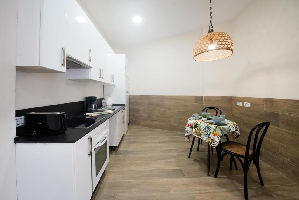 Kuchyňa alebo kuchynka v ubytovaní Suites La Merced