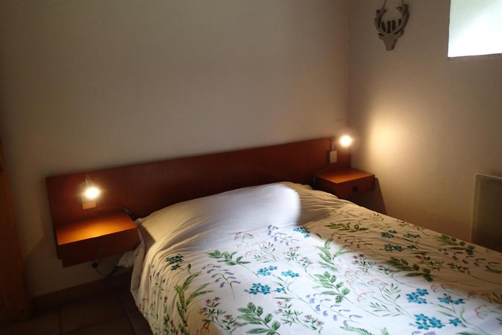Postel nebo postele na pokoji v ubytování artiguelongue grange restaurée