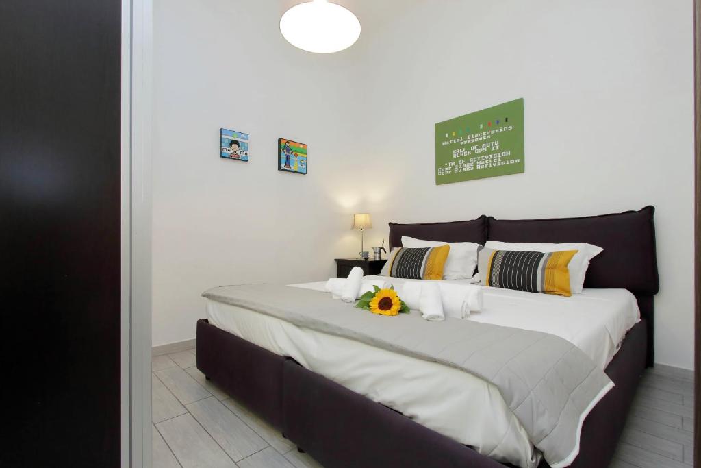 Posteľ alebo postele v izbe v ubytovaní 4BNB - Ombrellari 4