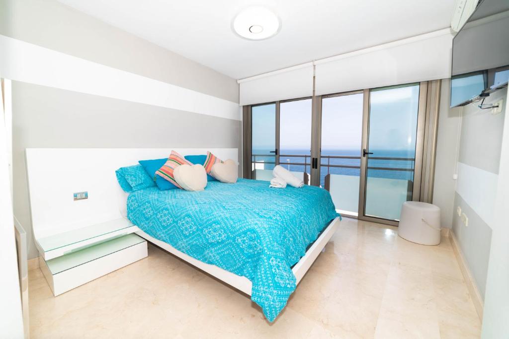 Postel nebo postele na pokoji v ubytování VILLA LUXURY VISTA DE MAR