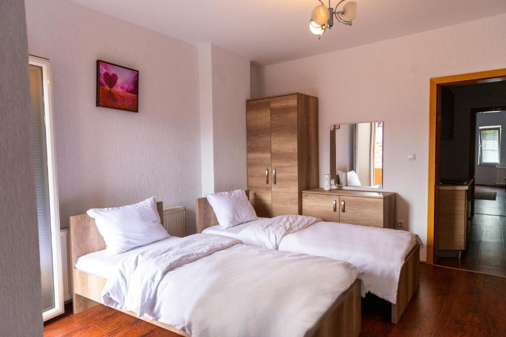 Postel nebo postele na pokoji v ubytování Hotel Park