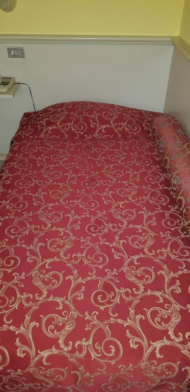 Postel nebo postele na pokoji v ubytování Hotel Monna Lisa