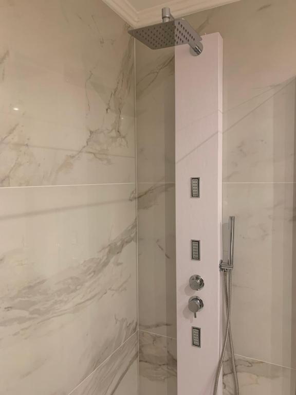 Koupelna v ubytování Rosso Aparthotel