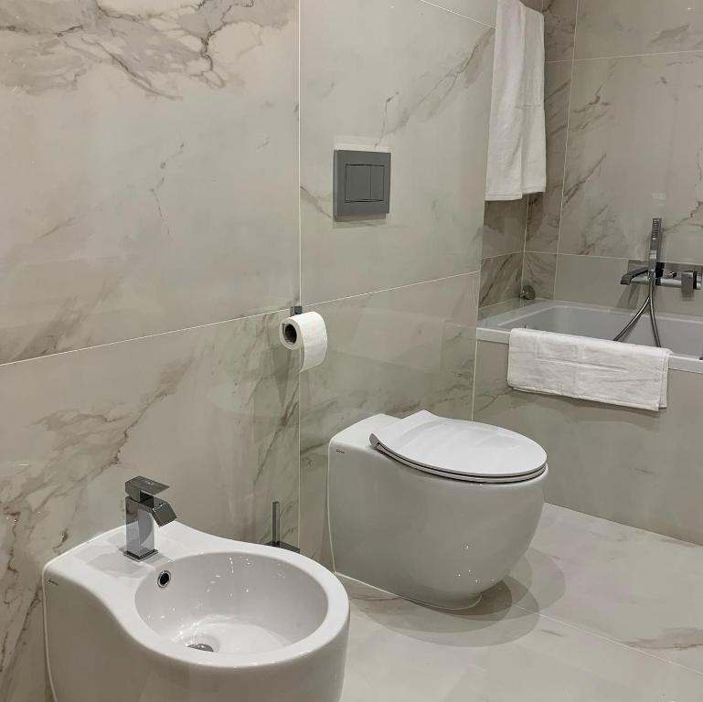 Koupelna v ubytování Rosso Aparthotel