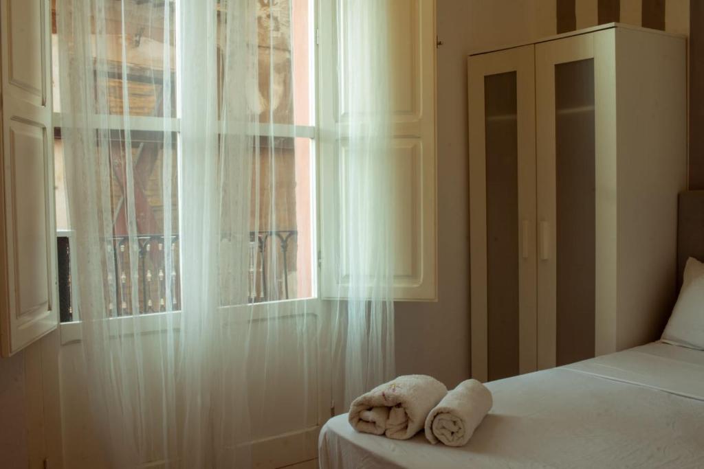 Postel nebo postele na pokoji v ubytování Apartamento Ene one