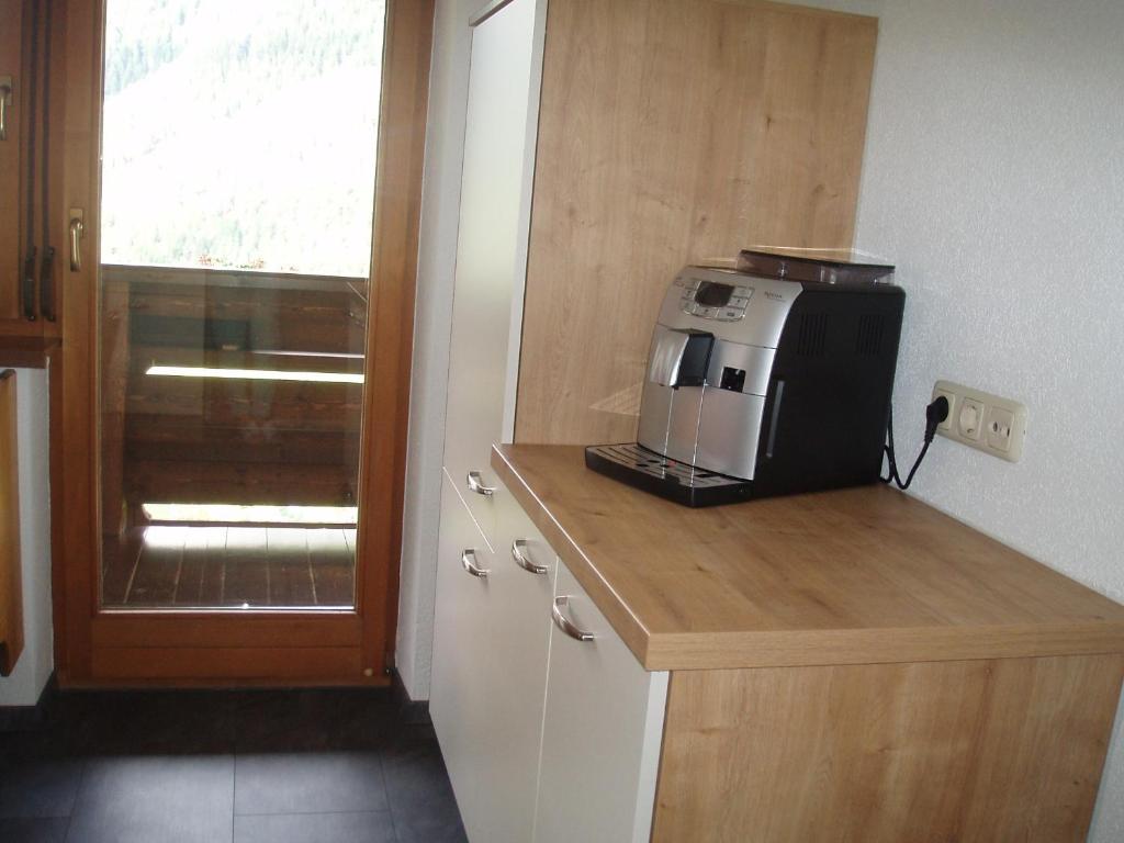 Kuchyňa alebo kuchynka v ubytovaní Appartement Harmonie