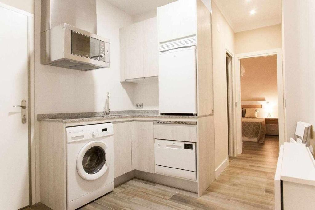 Kuchyň nebo kuchyňský kout v ubytování NEW Moderno y elegante apartamento céntrico