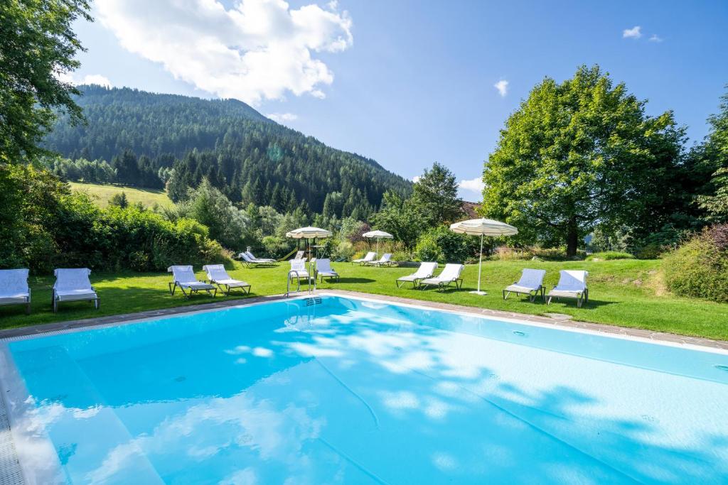 Bazén v ubytování Hotel Sonnalm - SPA,Idyll,Dining nebo v jeho okolí