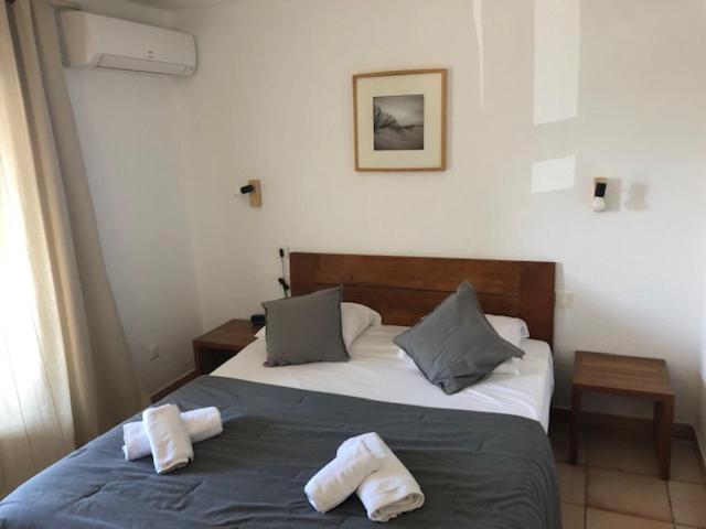 Postel nebo postele na pokoji v ubytování Hotel Le Bleu Marine