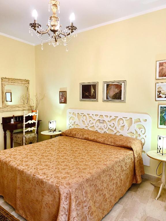 Postel nebo postele na pokoji v ubytování Al Vecchio Pioppo