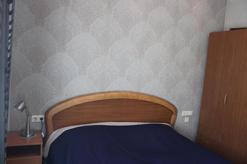 Postel nebo postele na pokoji v ubytování Ann's Apartment