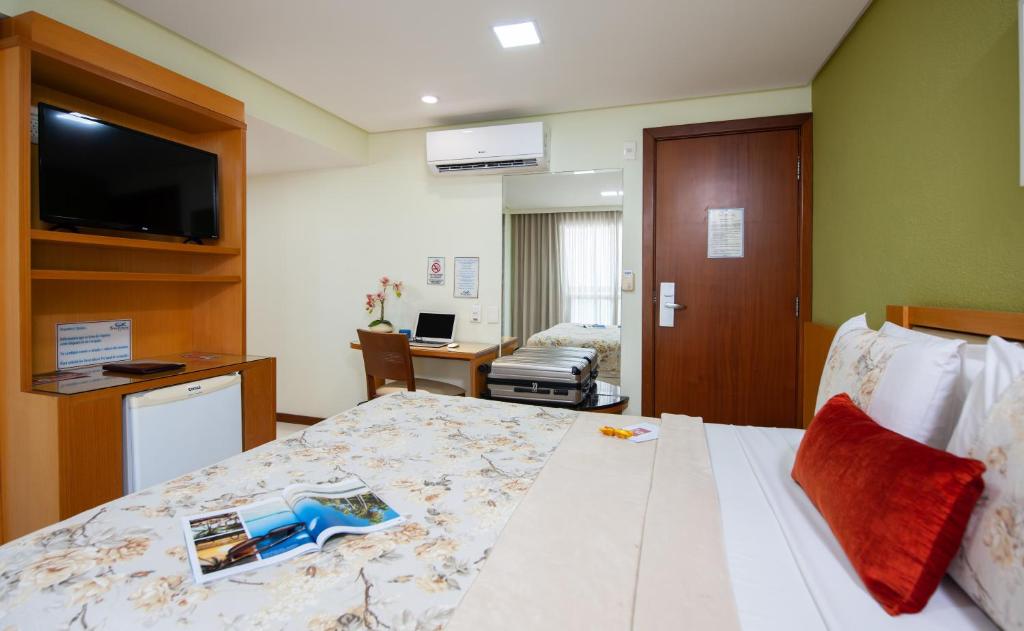 TV a/nebo společenská místnost v ubytování Hotel Santorini