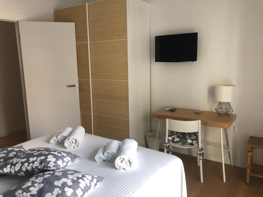 Łóżko lub łóżka w pokoju w obiekcie Home 22 Appartamento in centro storico - Catania
