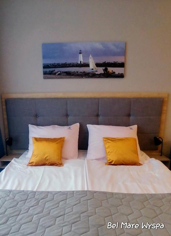 Posteľ alebo postele v izbe v ubytovaní Bel Mare Wyspa, apartament z parkingiem gratis