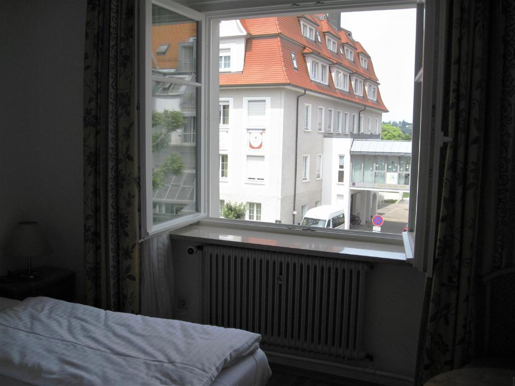 Postel nebo postele na pokoji v ubytování Hotel Möve garni
