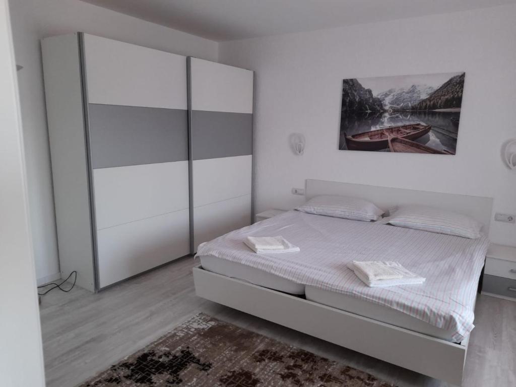 Postel nebo postele na pokoji v ubytování Casa Sannicolau