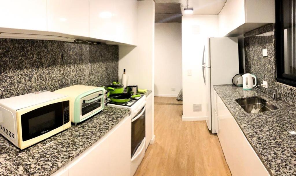 A cozinha ou cozinha compacta de Cilveti 468 departamento con cochera, excelente ubicación