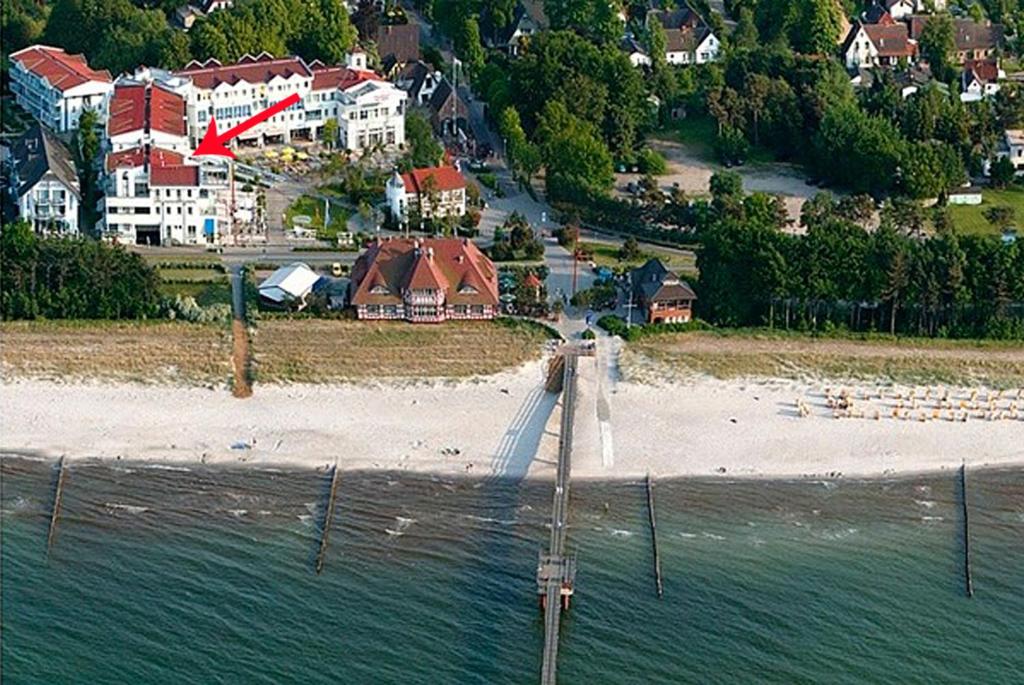an aerial view of a beach with buildings and houses at Am Kurhaus 318 PP 81 in Zingst