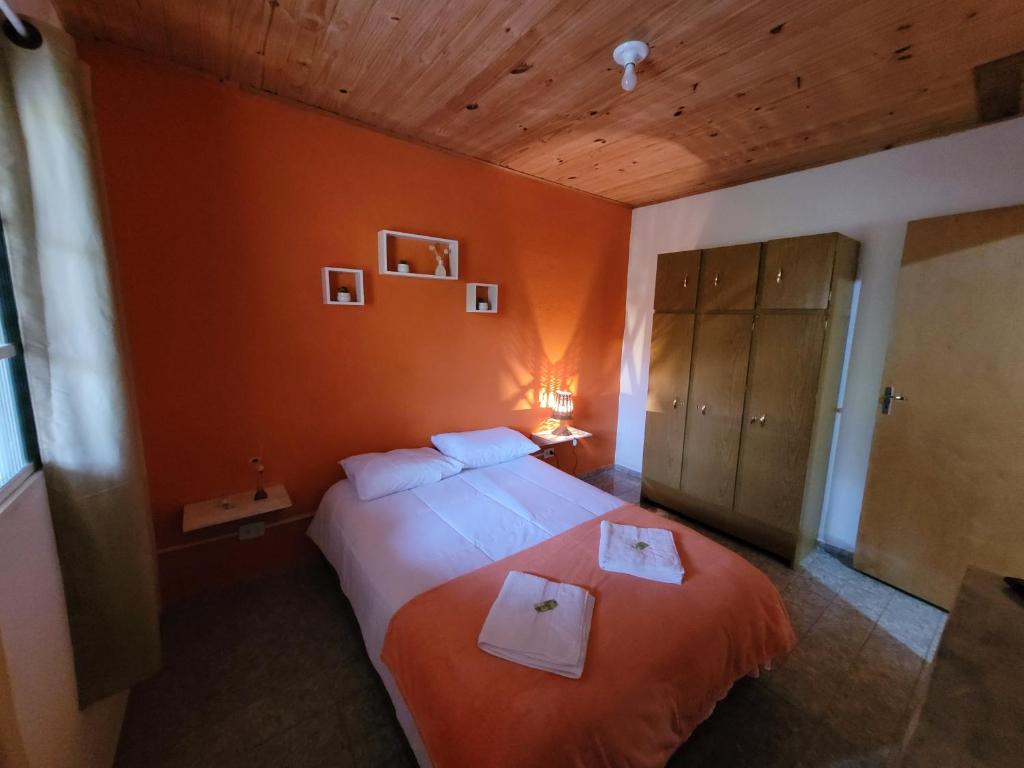 Postel nebo postele na pokoji v ubytování Chácara dos Pássaros