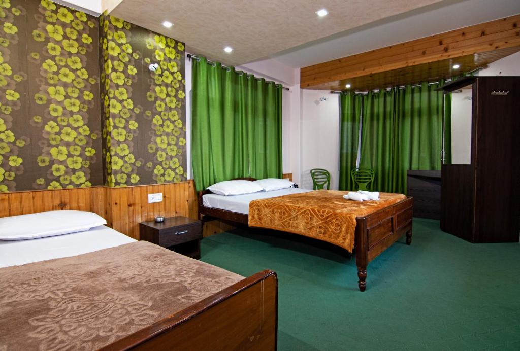 Postel nebo postele na pokoji v ubytování Hotel Paradiso
