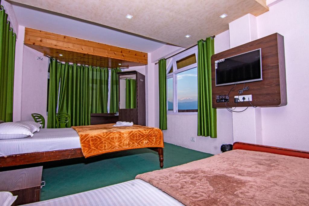TV a/nebo společenská místnost v ubytování Hotel Paradiso