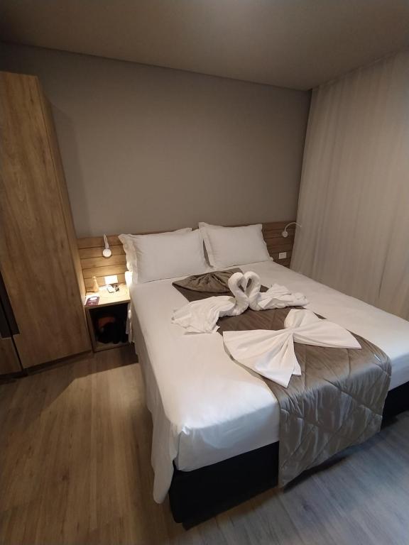 Postel nebo postele na pokoji v ubytování GOLDEN GRAMADO RESORT
