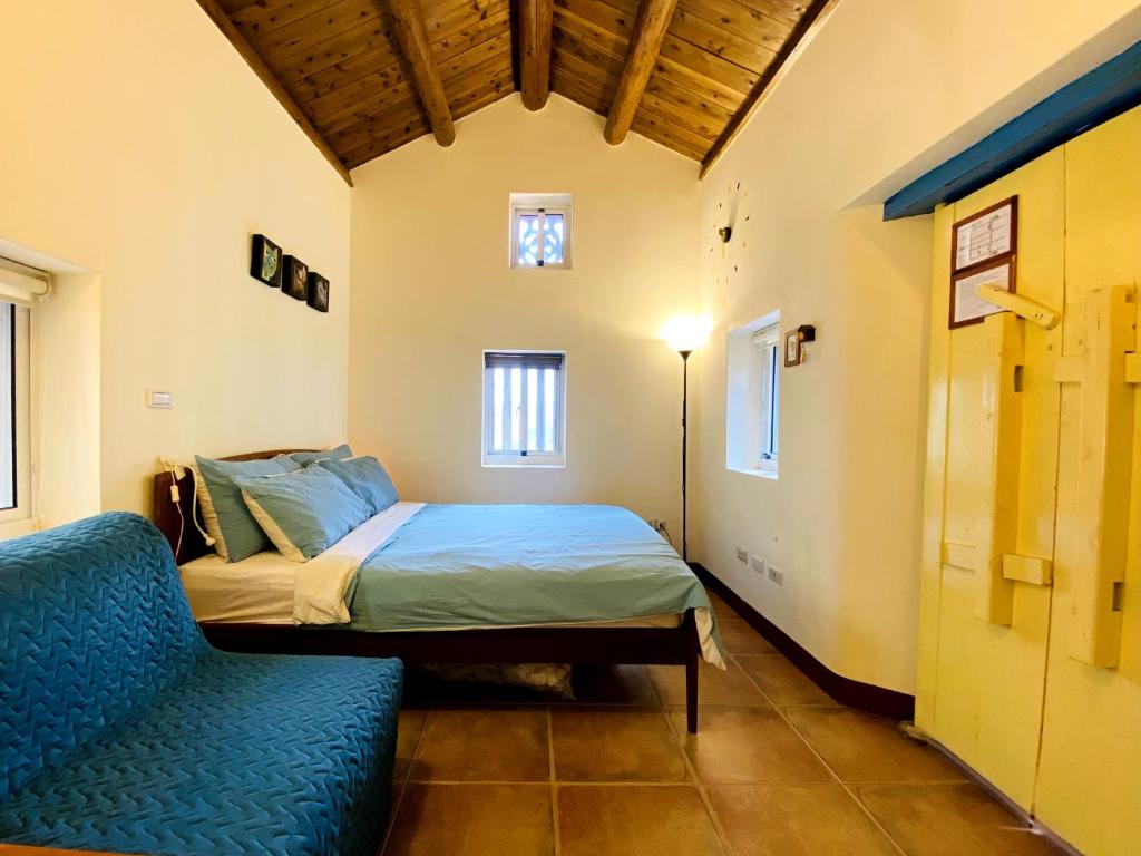 Postel nebo postele na pokoji v ubytování Cheng Village