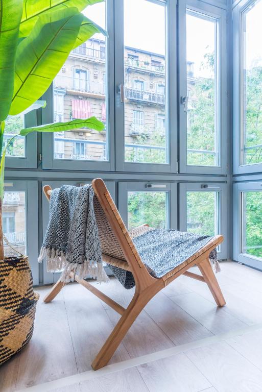 Posedenie v ubytovaní Apartamentos Bellas Artes