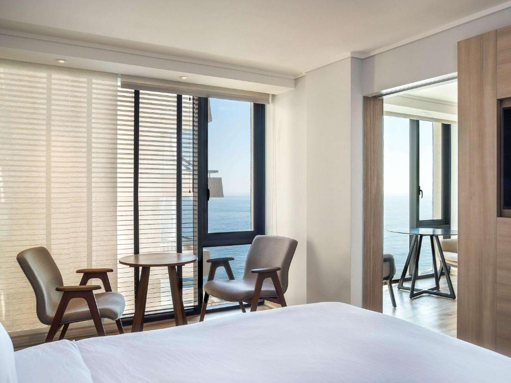 Cama o camas de una habitación en Pullman Vina del Mar San Martin