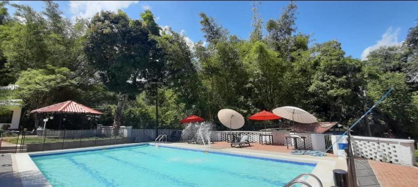 Bazén v ubytování Eco Hotel Entre Ríos nebo v jeho okolí