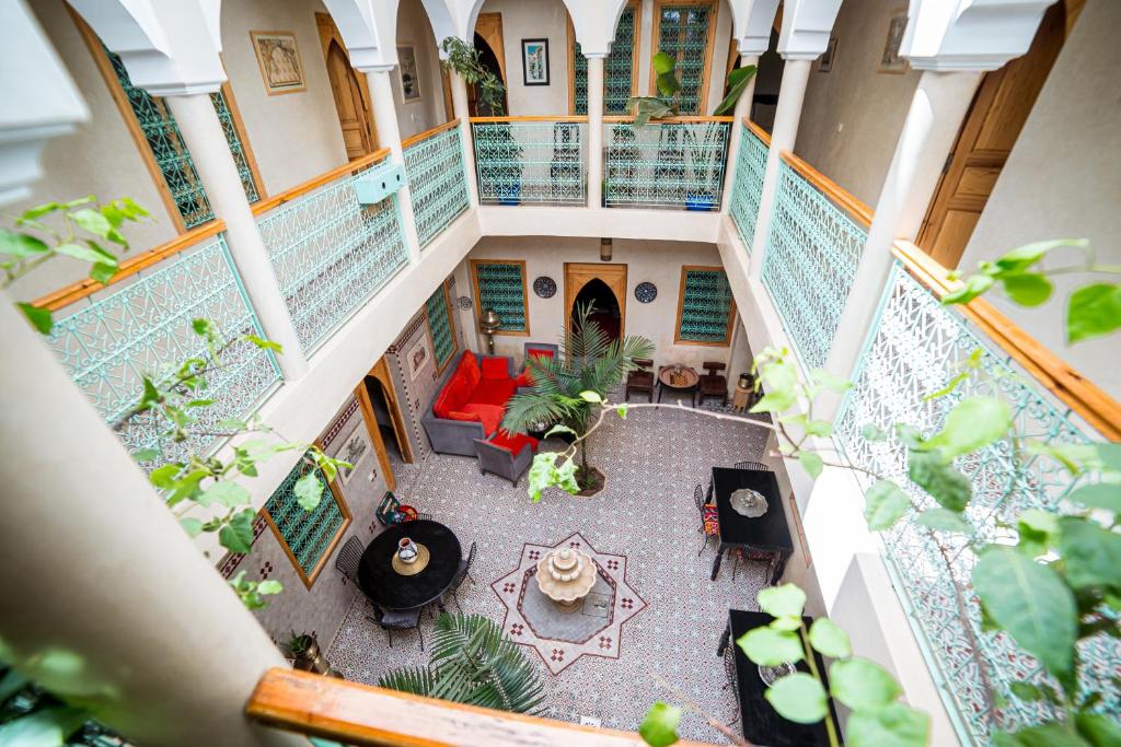 an overhead view of arium of a building with plants at Riad Inaka in Marrakech