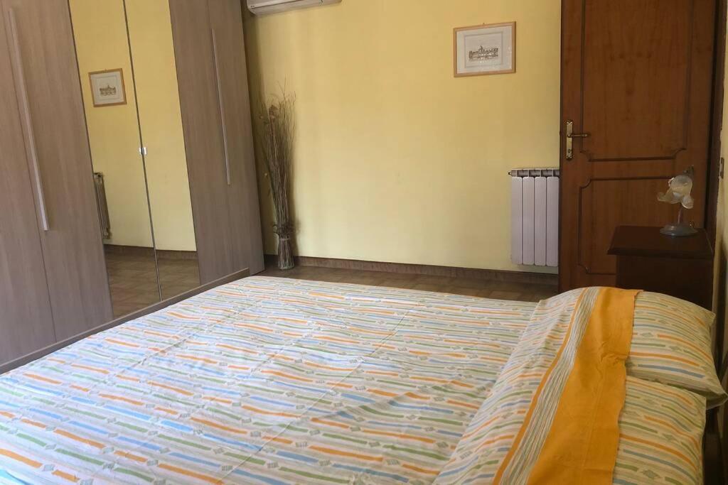 A bed or beds in a room at Villa Anna Paola