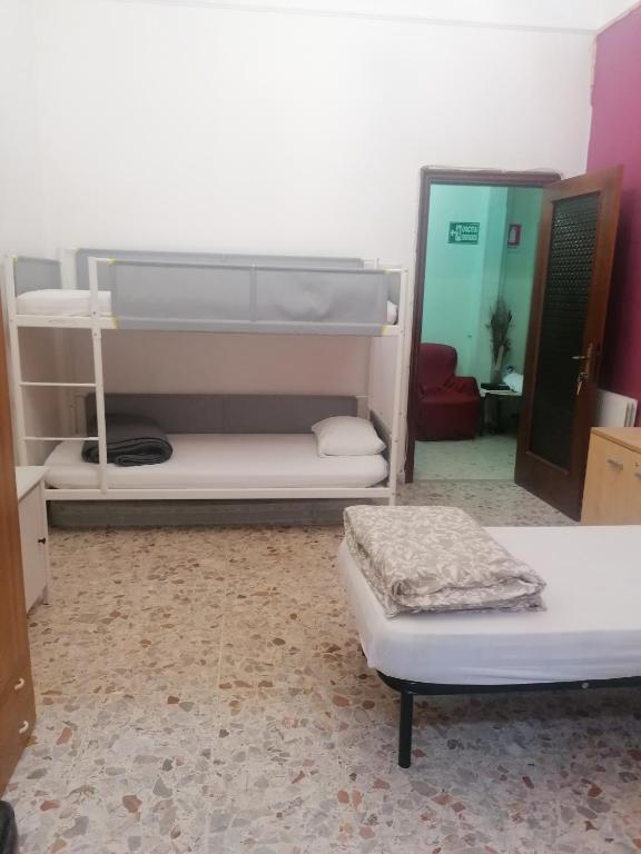 Postel nebo postele na pokoji v ubytování Dream Destination Rome