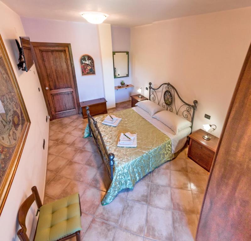 Posteľ alebo postele v izbe v ubytovaní B&B TorreMatta