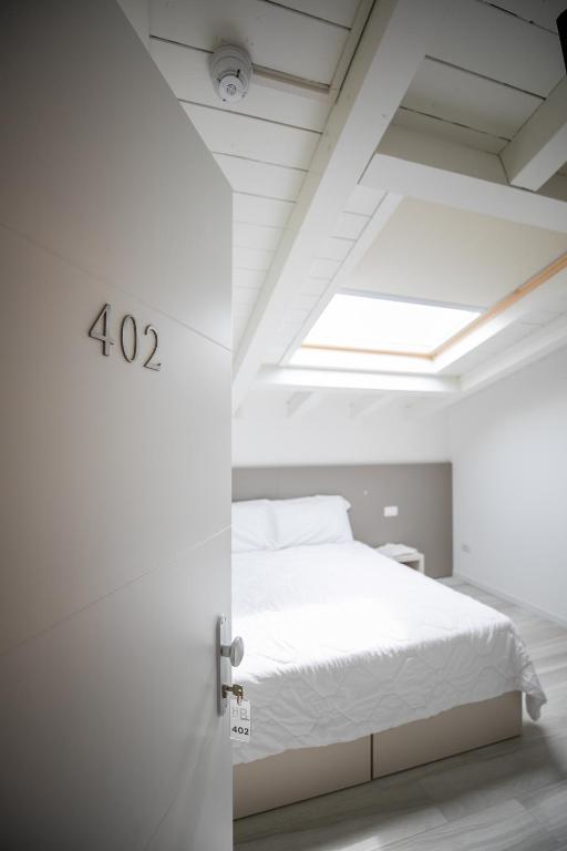Postel nebo postele na pokoji v ubytování Hotel Boston 3 Stelle Superior Frontemare
