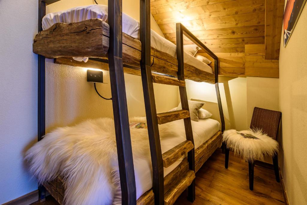 Postel nebo postele na pokoji v ubytování Hôtel Neste de Jade