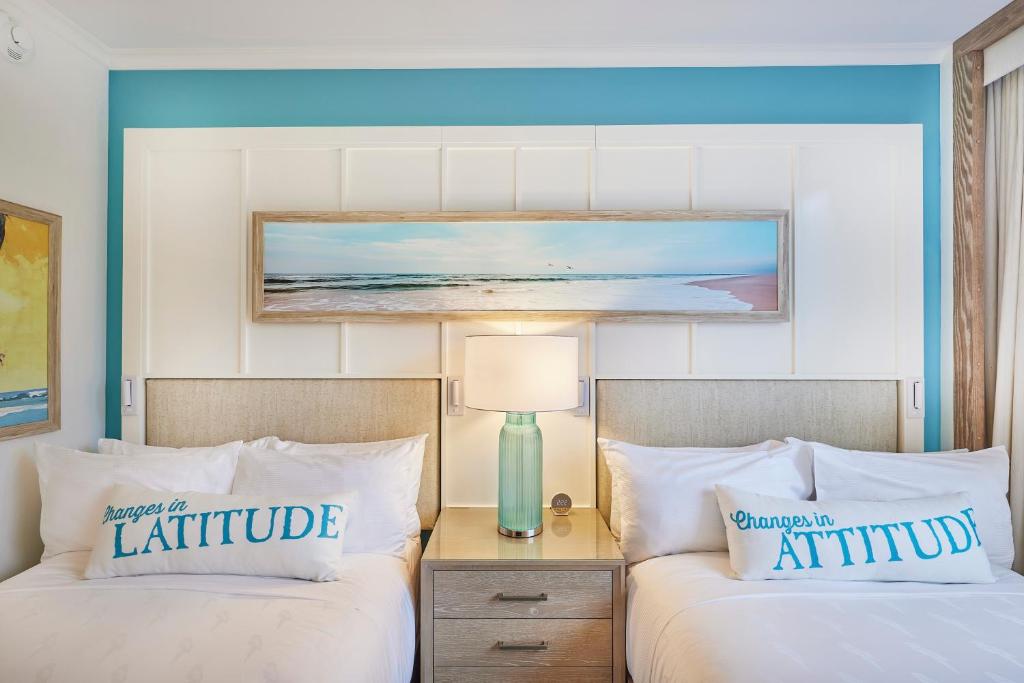 Ein Bett oder Betten in einem Zimmer der Unterkunft Margaritaville Resort Times Square