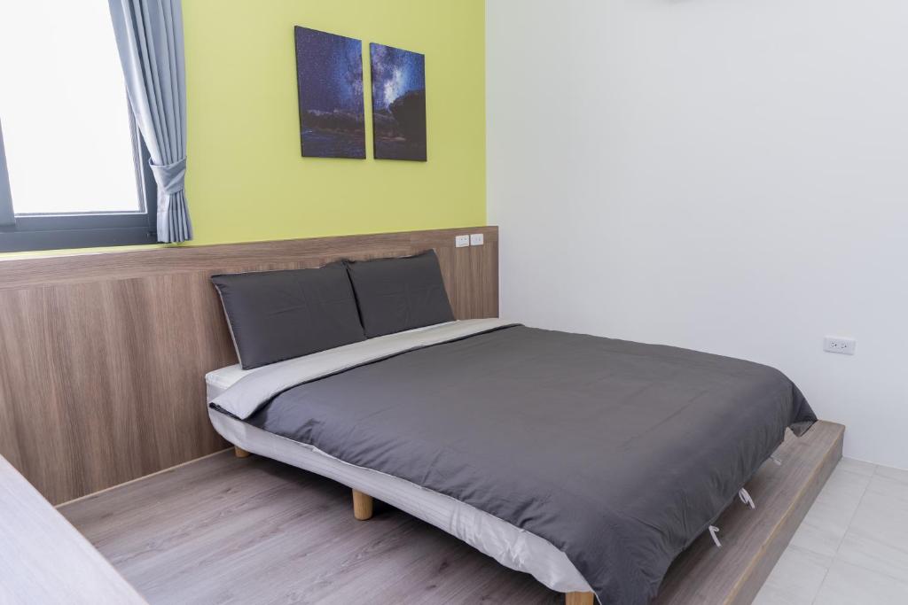 Postel nebo postele na pokoji v ubytování Colorful B&B