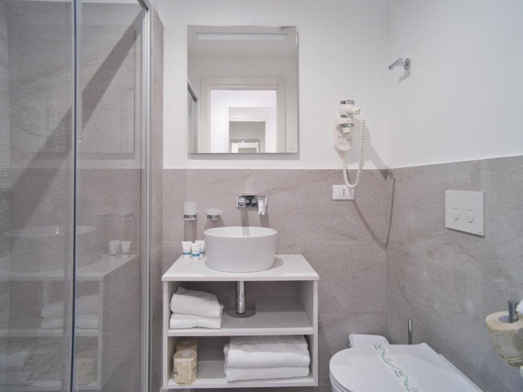 Ванная комната в Hotel Medusa