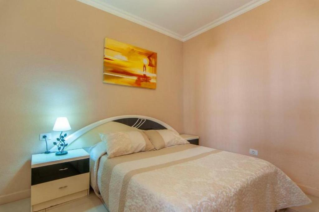 Postel nebo postele na pokoji v ubytování Apartament 1 bedroom Los Cristianos Las Vistas beach