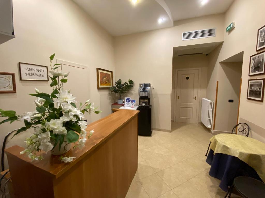 TV a/nebo společenská místnost v ubytování Albergo Ristorante del Cacciatore