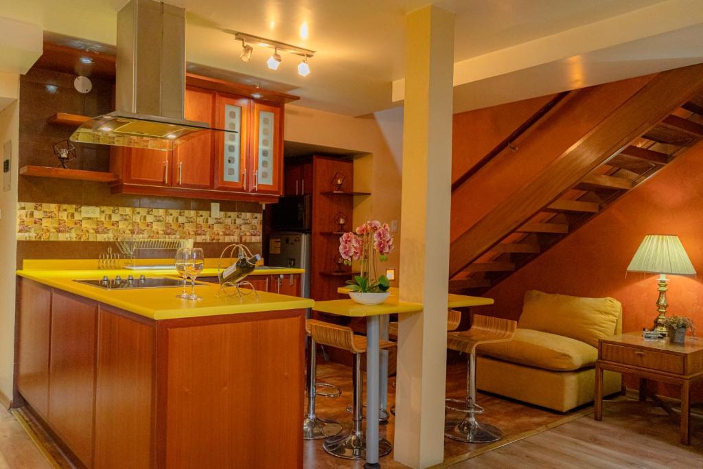 Kuchyň nebo kuchyňský kout v ubytování Rincón Familiar Hostel Boutique