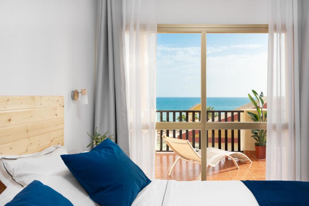 Posteľ alebo postele v izbe v ubytovaní Romana Playa Marbella Vistas al Mar