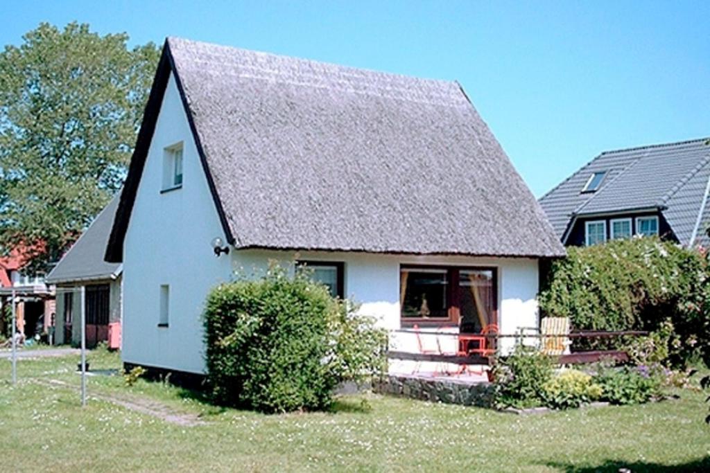 a white house with a gray roof at Tabbert, Kerstin - 21697 in Zingst